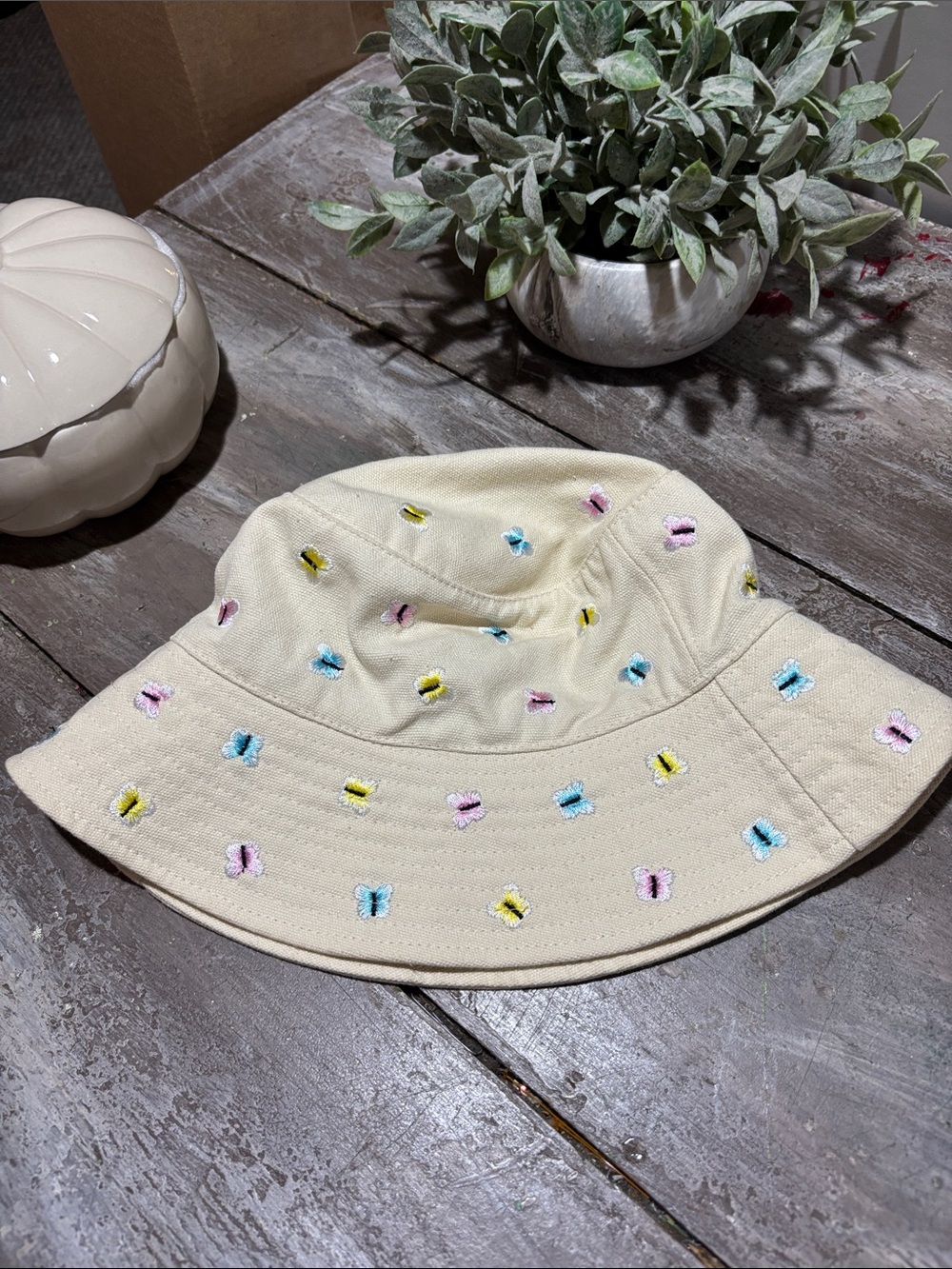 Urban Outfitters Cream Bucket Hat with Multicolor Embroidery